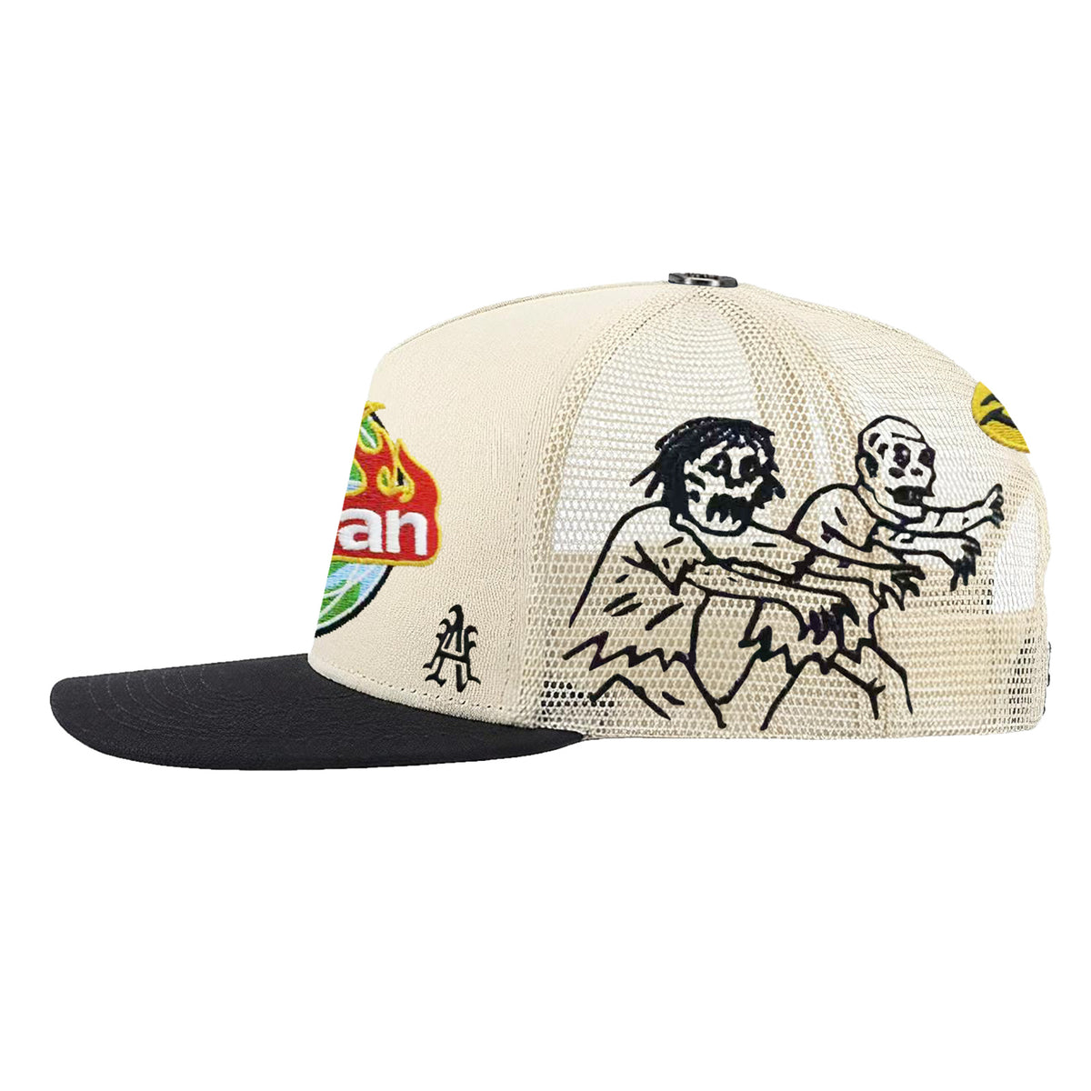 MANSON V2 trucker hat, Cream/Black, side view with black skeleton artwork and A logo